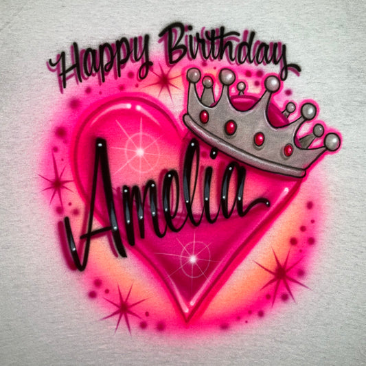 Personalized Happy Birthday airbrush shirt with custom name, pink heart, jeweled silver crown and starburst accents