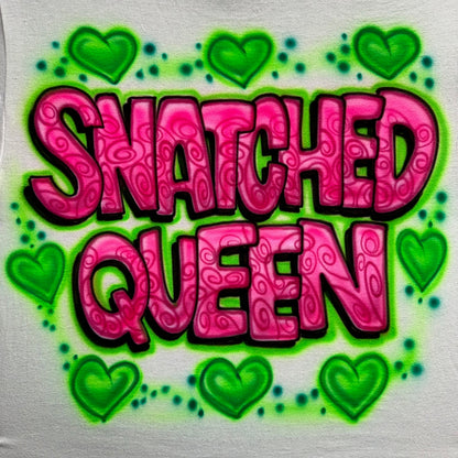 Hand-airbrushed Snatched Queen shirt with graffiti lettering and heart accents, bold custom artwork by Fresh Air Shirts