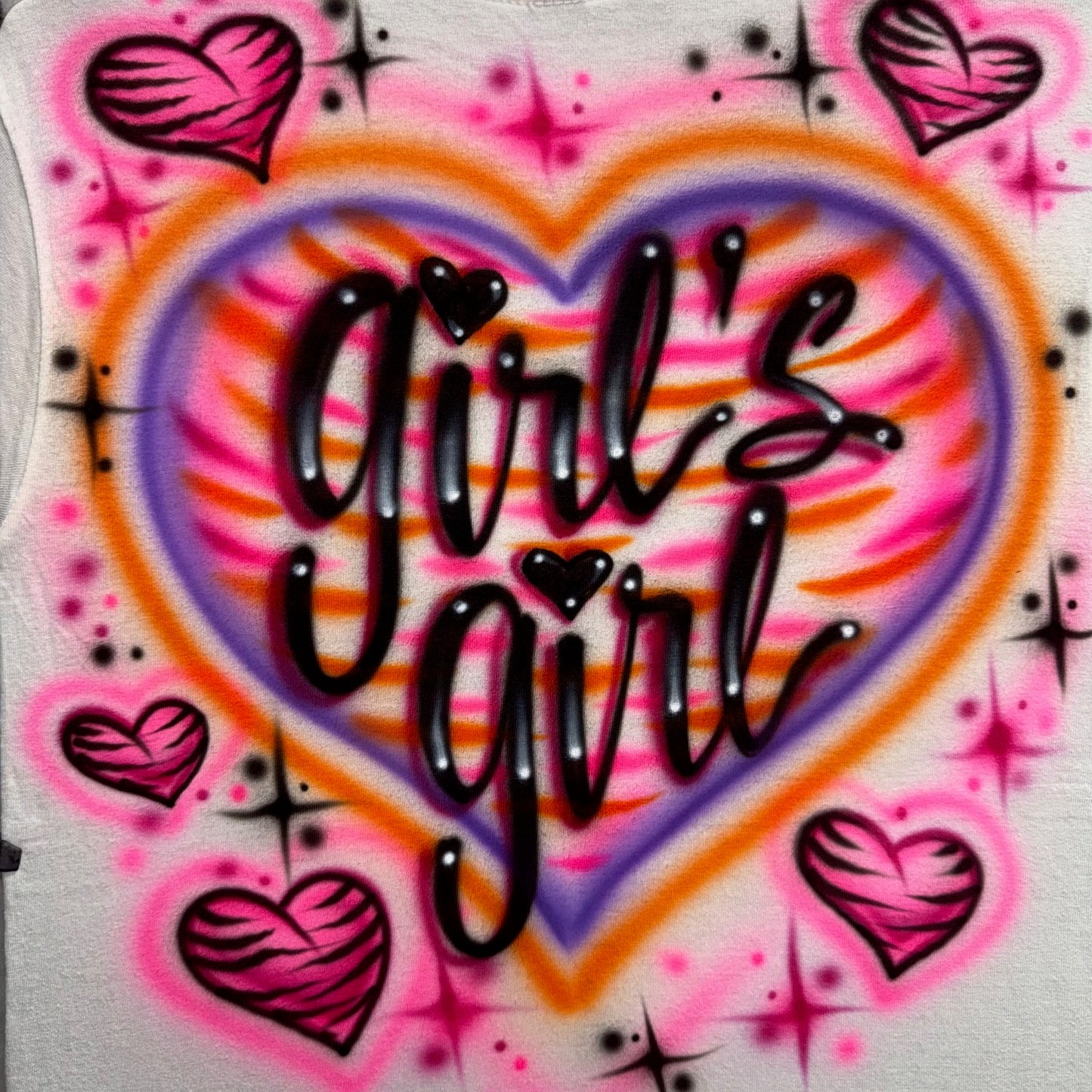 Airbrushed Girls Girl design with neon striped heart and pink zebra-print hearts.