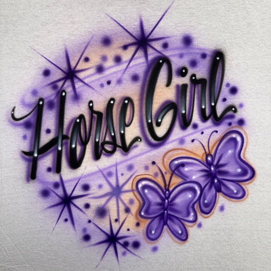 Horse Girl airbrushed shirt featuring custom script text, purple butterflies, sparkles, and hand-painted airbrush details