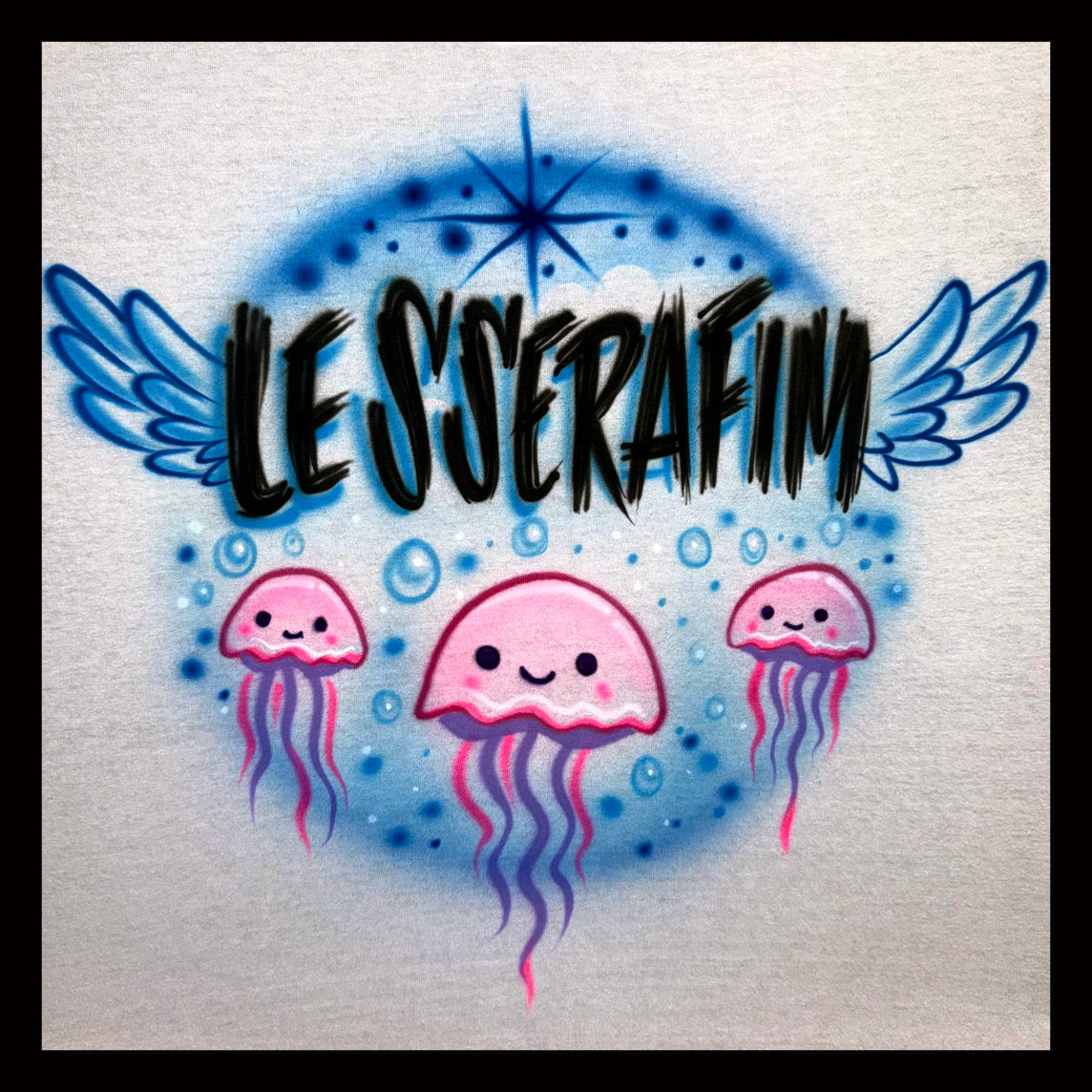 Le Sserafim scratch letters airbrush tee with angel wings and jellyfish