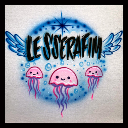 Le Sserafim scratch letters airbrush tee with angel wings and jellyfish