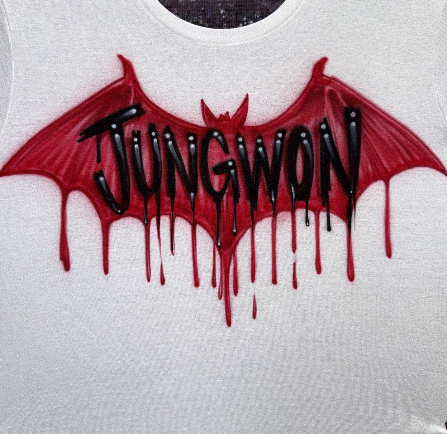 Hand-airbrushed custom blood drip bat wings design featuring glossy black drippy lettering, crimson bat wings, and gothic airbrush styling