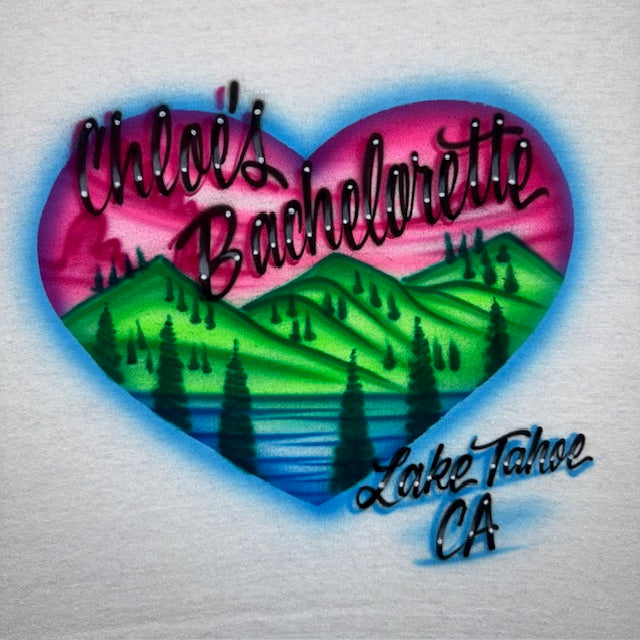 Heart-shaped mountains and lake and sunset airbrushed t-shirt