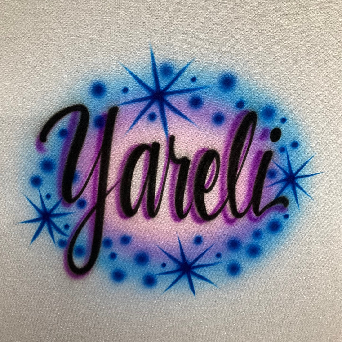Name airbrushed shirt or sweatshirt with starbursts and accents